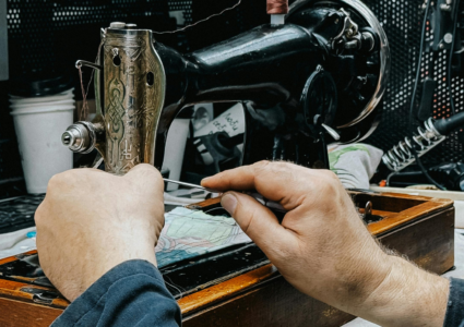How can you properly sew patches onto your uniform?